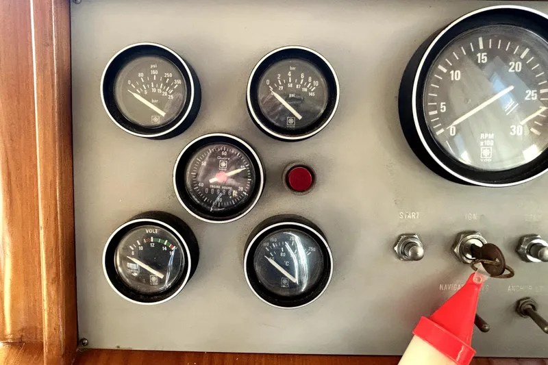 Chrysalis Yacht Photos Pics Dashboard of 1989 Ocean Alexander 44 CPMY with gauges and ignition key.