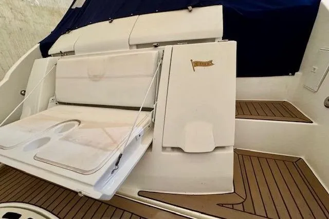  Yacht Photos Pics 2013 Cruisers Yachts 540 Sports Coupe, rear deck view with seating and teak flooring.