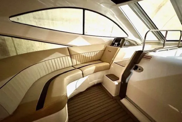  Yacht Photos Pics Interior of 2013 Cruisers Yachts 540 Sports Coupe with elegant seating and modern design.