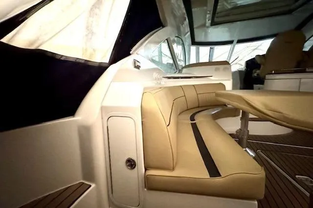  Yacht Photos Pics 2013 Cruisers Yachts 540 Sports Coupe interior with luxurious seating and modern design.