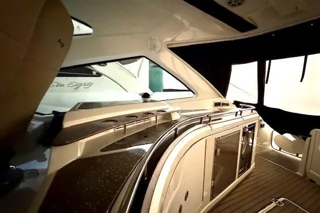  Yacht Photos Pics 2013 Cruisers Yachts 540 Sports Coupe interior with sleek design and modern amenities.