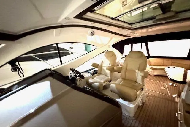  Yacht Photos Pics Interior of 2013 Cruisers Yachts 540 Sports Coupe with luxurious seating and modern design.
