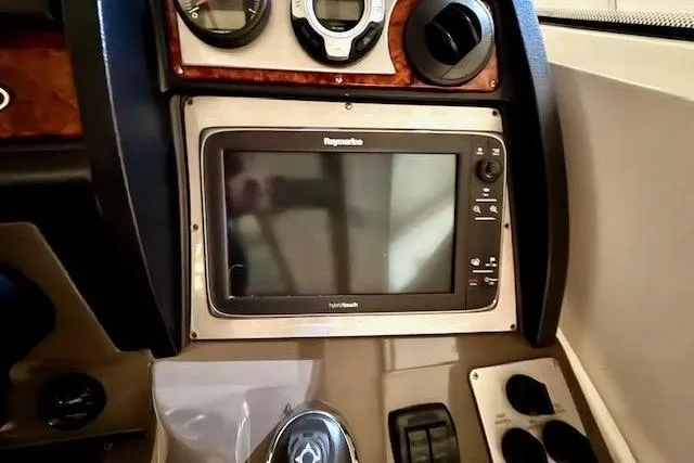  Yacht Photos Pics Control panel of 2013 Cruisers Yachts 540 Sports Coupe with navigation system.