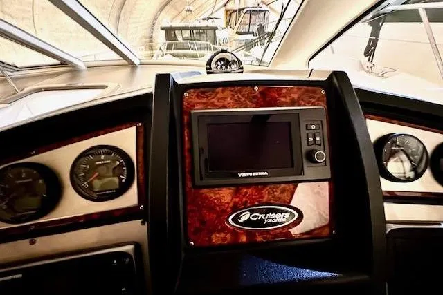  Yacht Photos Pics Dashboard of 2013 Cruisers Yachts 540 Sports Coupe with navigation controls.