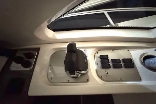  Yacht Photos Pics Control panel of 2013 Cruisers Yachts 540 Sports Coupe with joystick and switches.