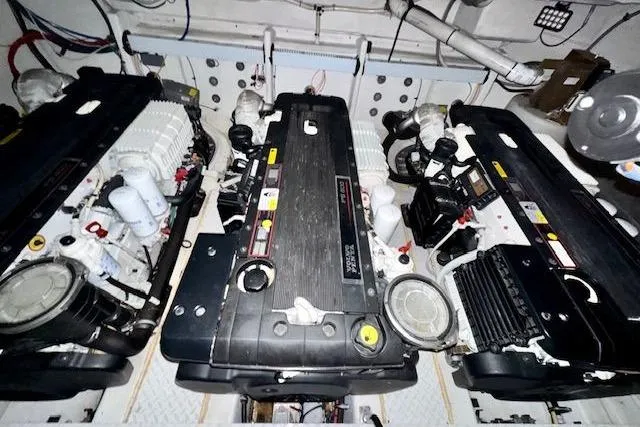  Yacht Photos Pics Engine room of 2013 Cruisers Yachts 540 Sports Coupe with three powerful engines.