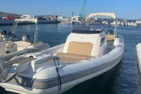 2017 Capelli Tempest 40 boat docked in a marina under clear blue skies.