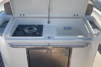 Outdoor kitchen on 2017 Capelli Tempest 40 boat with stove and sink.