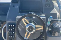 Steering console of a 2017 Capelli Tempest 40 boat with controls and navigation equipment.