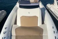 2017 Capelli Tempest 40 boat docked at marina, featuring spacious deck and seating.