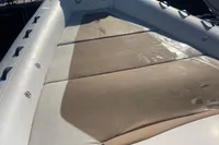 2017 Capelli Tempest 40 boat docked, featuring spacious sunbathing area.