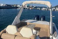 2017 Capelli Tempest 40 boat docked in marina, featuring spacious seating and twin engines.