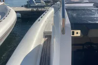 2017 Capelli Tempest 40 boat docked at marina, sunny day.