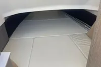 Interior cabin of 2017 Capelli Tempest 40 with cushioned seating.