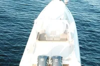 2017 Capelli Tempest 40 boat on calm blue water, aerial view.