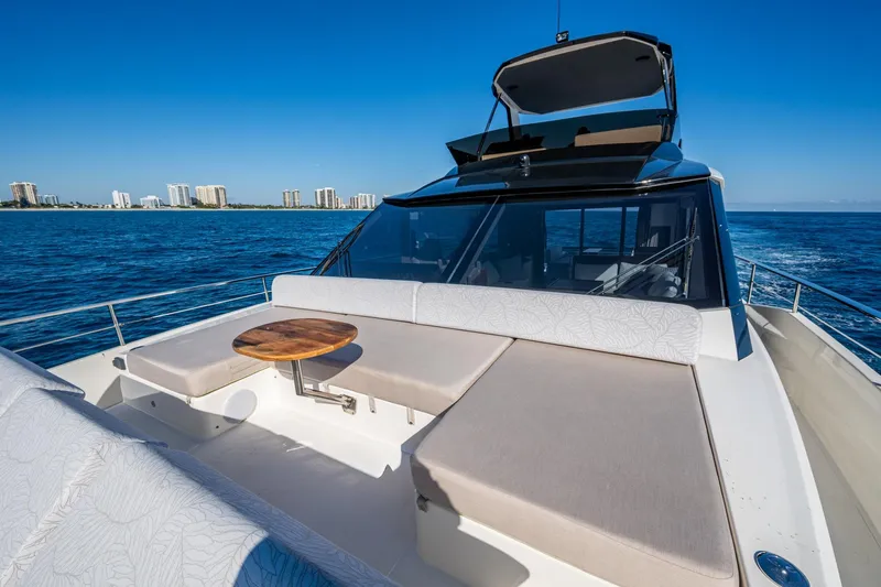 Alamar Yacht Photos Pics 2023 Astondoa AS5 yacht with spacious deck seating and ocean view.