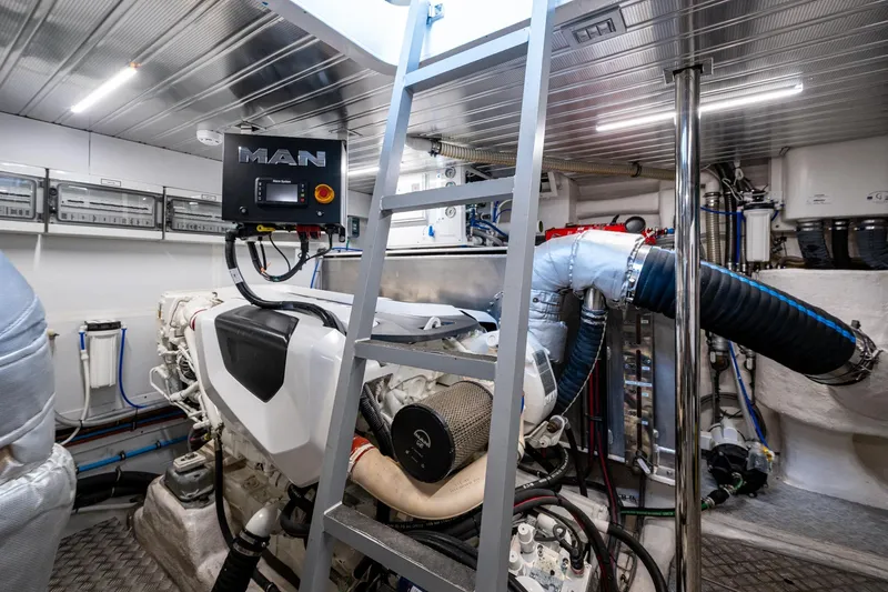 Alamar Yacht Photos Pics Engine room of 2023 Astondoa AS5 yacht with MAN engine and modern equipment.