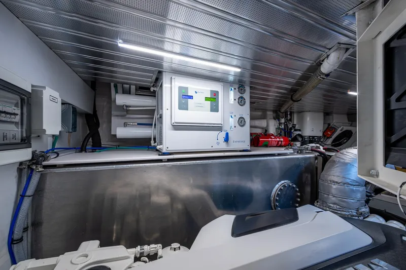 Alamar Yacht Photos Pics Engine room of 2023 Astondoa AS5 yacht with advanced control systems and equipment.