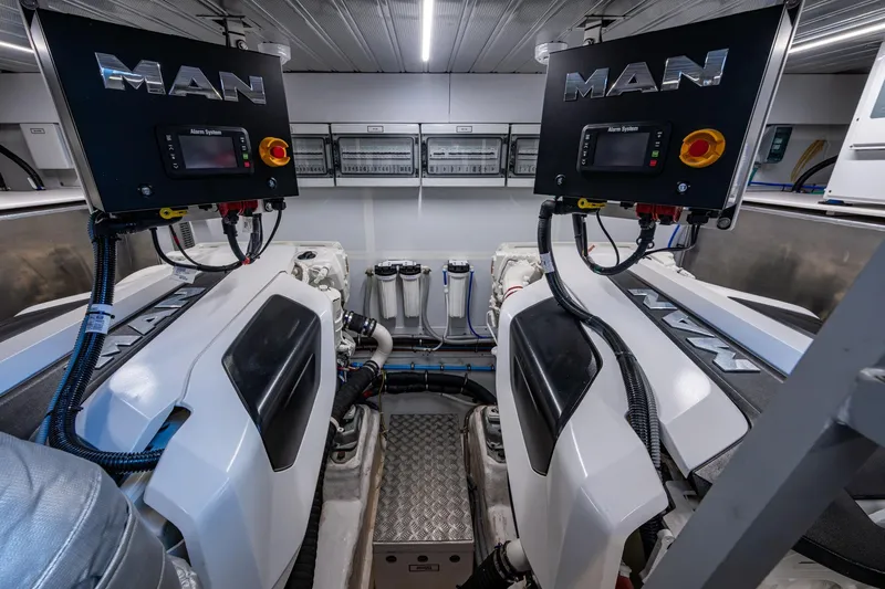 Alamar Yacht Photos Pics Engine room of 2023 Astondoa AS5 yacht featuring dual MAN engines.