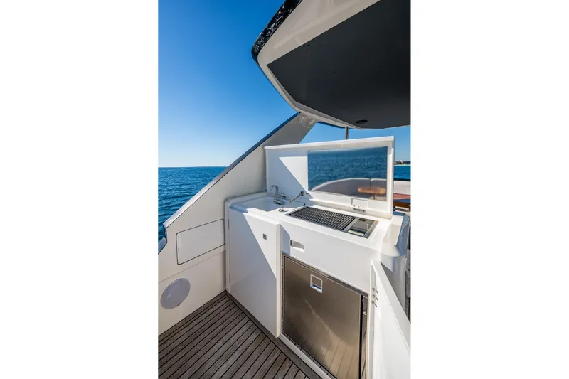 Alamar Yacht Photos Pics 2023 Astondoa AS5 yacht outdoor kitchen with ocean view.