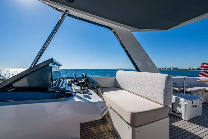 Alamar Yacht Photos Pics 2023 Astondoa AS5 yacht helm with ocean view and seating area.