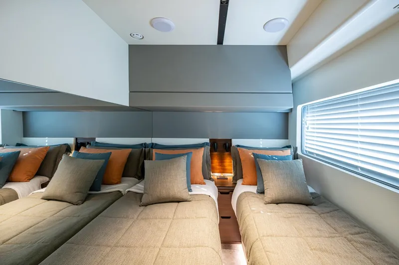 Alamar Yacht Photos Pics Luxurious 2023 Astondoa AS5 yacht cabin with twin beds and elegant decor.