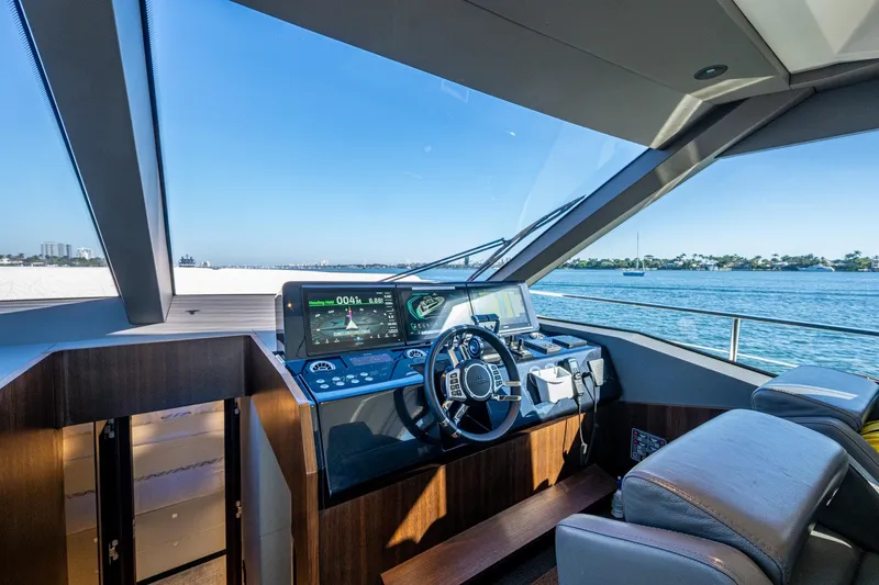 Alamar Yacht Photos Pics 2023 Astondoa AS5 yacht helm with modern navigation system and ocean view.