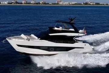 Alamar Yacht Photos Pics 2023 Astondoa AS5 yacht cruising on open water, showcasing sleek design and luxury.