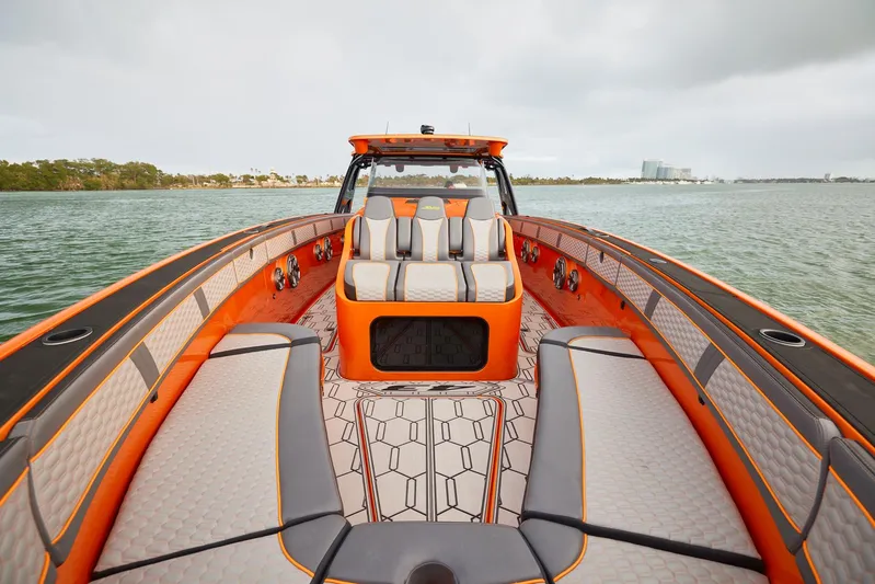  Yacht Photos Pics 2023 Midnight Express 43' Solstice boat with orange and gray interior on the water.