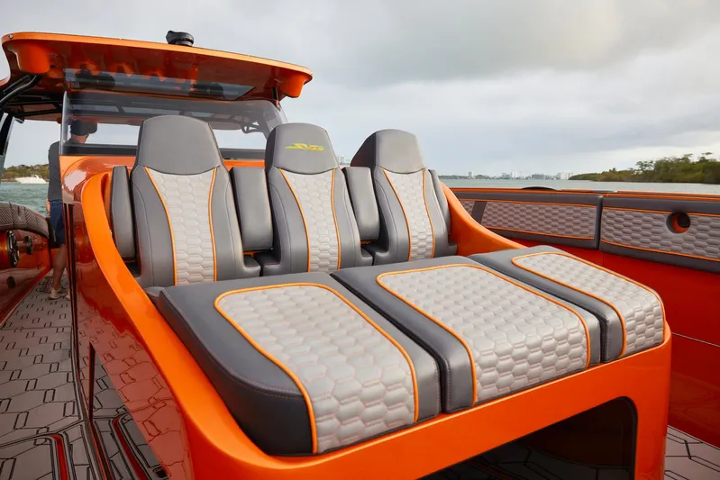  Yacht Photos Pics 2023 Midnight Express 43' Solstice boat with luxurious orange and gray seating.