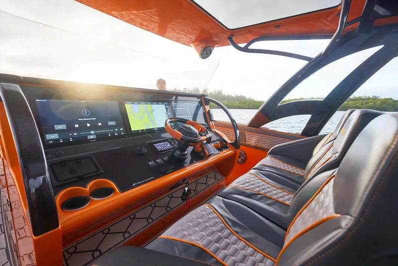  Yacht Photos Pics 2023 Midnight Express 43' Solstice boat interior with modern dashboard and luxurious seating.