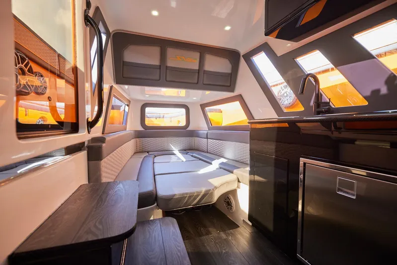  Yacht Photos Pics Luxurious interior of 2023 Midnight Express 43' Solstice yacht with modern seating and kitchenette.