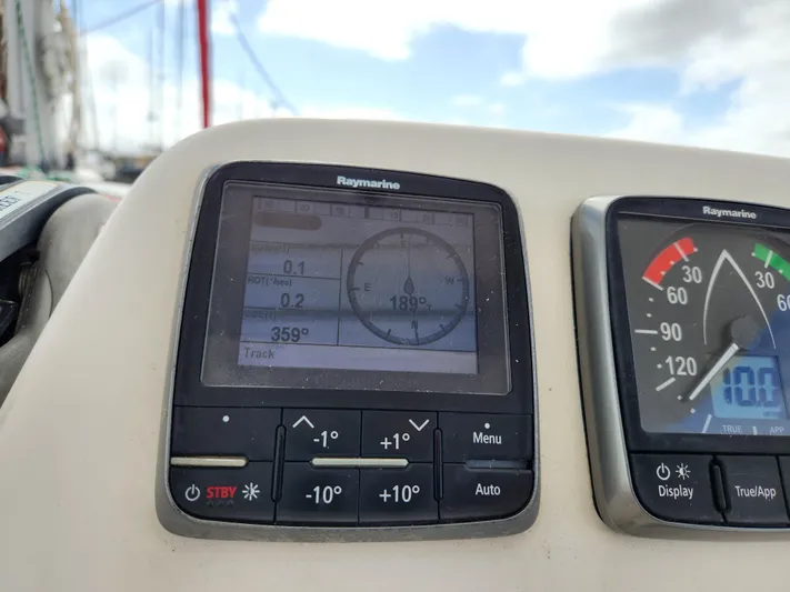 Cara Lynn Yacht Photos Pics Boat navigation instruments on a 2015 Leopard 44 catamaran, displaying compass and speed data.