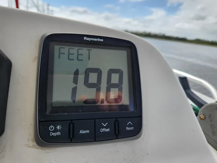 Cara Lynn Yacht Photos Pics Depth gauge on Leopard 44 boat showing 19.8 feet.