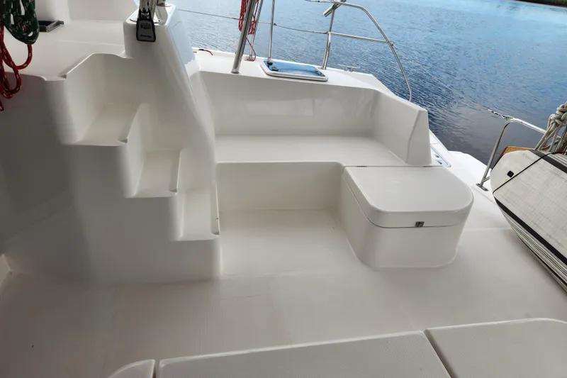 Cara Lynn Yacht Photos Pics Spacious deck area of a 2015 Leopard 44 catamaran with seating and storage.