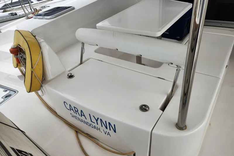 Cara Lynn Yacht Photos Pics Leopard 44 catamaran deck with life preserver, named "Cara Lynn," Shenandoah, VA.