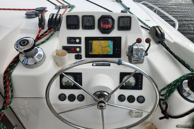 Cara Lynn Yacht Photos Pics Steering wheel and navigation controls on a 2015 Leopard 44 catamaran.