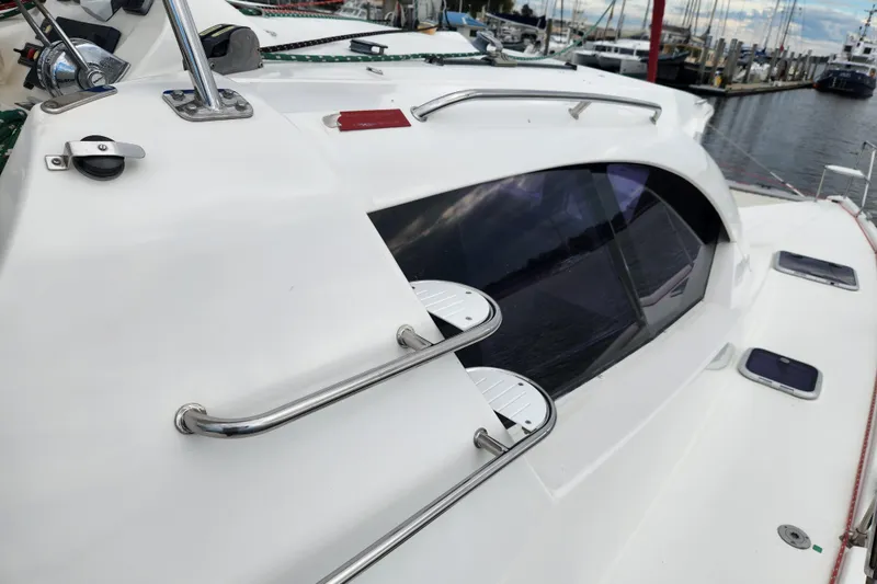 Cara Lynn Yacht Photos Pics 2015 Leopard 44 yacht deck with sleek design and stainless steel railings.