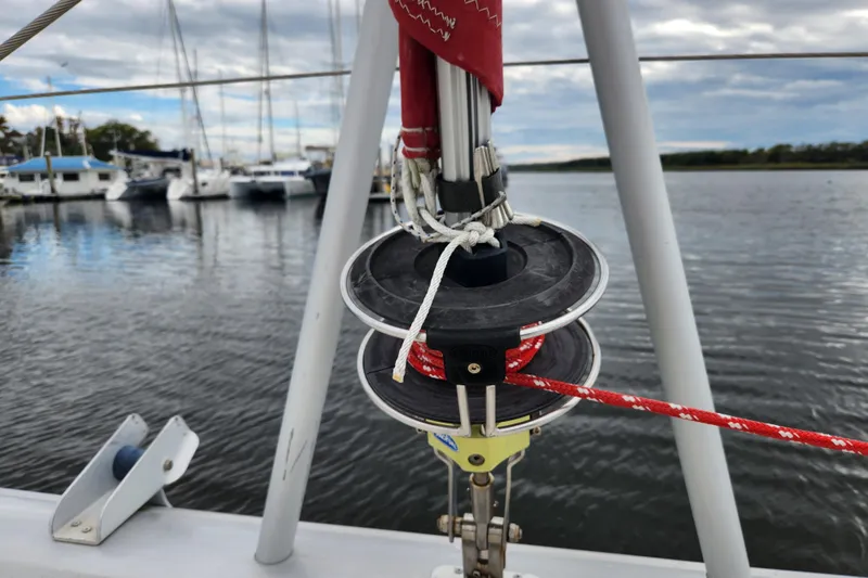 Cara Lynn Yacht Photos Pics Close-up of a 2015 Leopard 44 sailboat rigging at a marina.
