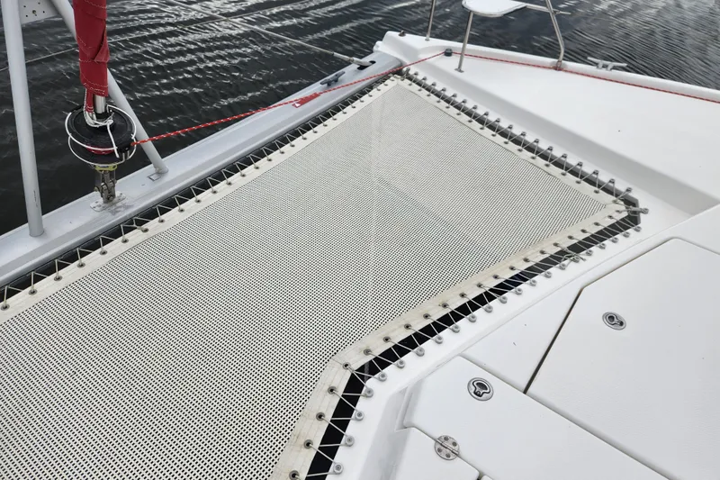 Cara Lynn Yacht Photos Pics Trampoline netting on a 2015 Leopard 44 catamaran, showcasing deck details and rigging.