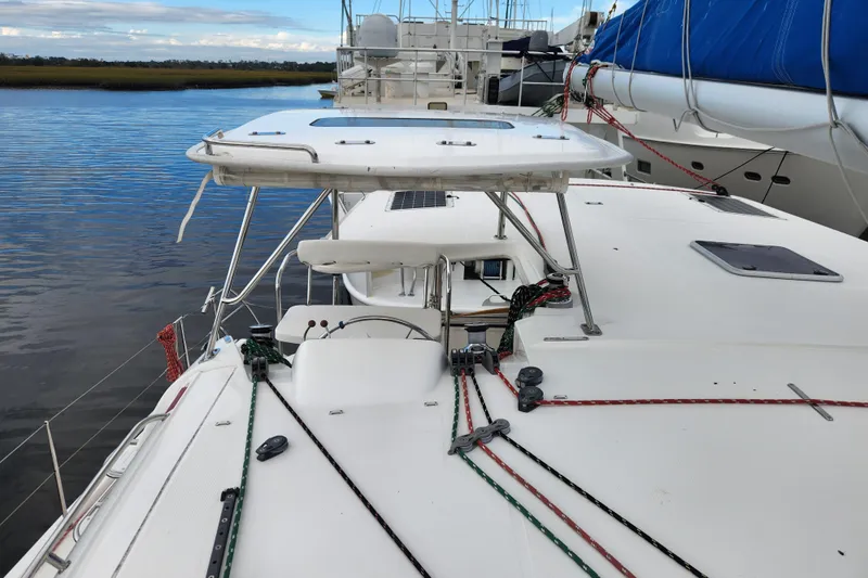 Cara Lynn Yacht Photos Pics 2015 Leopard 44 catamaran docked, showcasing deck and rigging details.