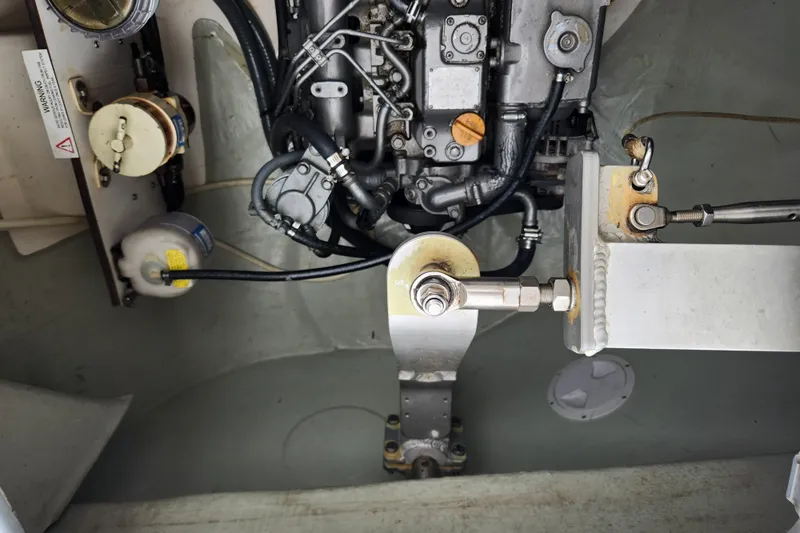 Cara Lynn Yacht Photos Pics Engine compartment of a 2015 Leopard 44 yacht, showcasing mechanical components and connections.