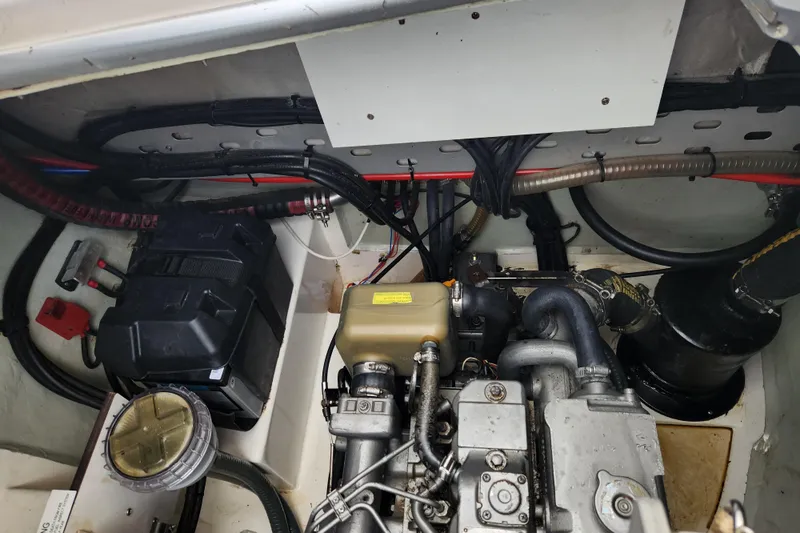 Cara Lynn Yacht Photos Pics Engine compartment of a 2015 Leopard 44 yacht, showcasing mechanical components and wiring.