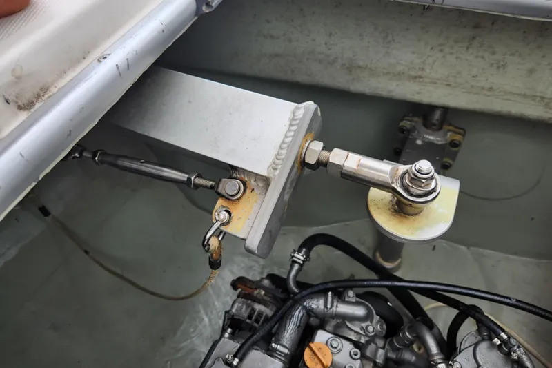 Cara Lynn Yacht Photos Pics Engine compartment of a 2015 Leopard 44 catamaran, showcasing mechanical components and connections.