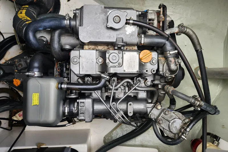 Cara Lynn Yacht Photos Pics Engine of a 2015 Leopard 44 yacht, showcasing intricate mechanical components.