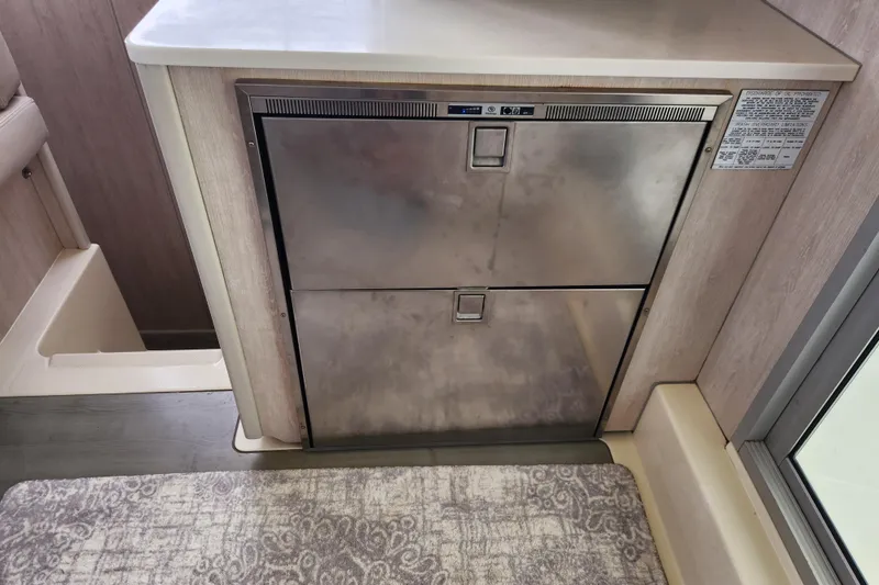Cara Lynn Yacht Photos Pics Stainless steel fridge in 2015 Leopard 44 catamaran interior.