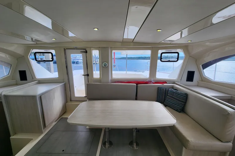Cara Lynn Yacht Photos Pics Interior of 2015 Leopard 44 catamaran with spacious seating and ocean view.