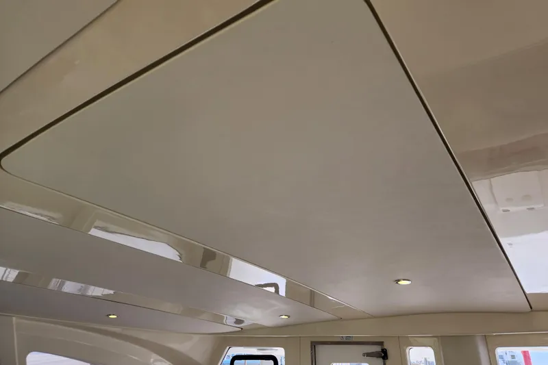 Cara Lynn Yacht Photos Pics Interior ceiling of a 2015 Leopard 44 yacht with recessed lighting.