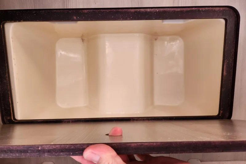 Cara Lynn Yacht Photos Pics Open storage compartment of a 2015 Leopard 44 yacht, showing interior space.