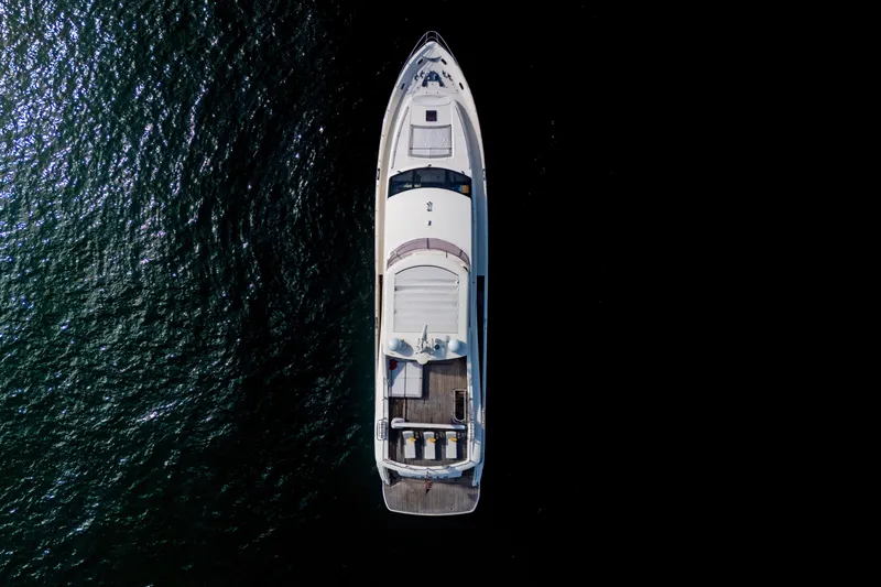Oasis Yacht Photos Pics Overhead view of 2010 Princess 95 Motor Yacht on dark water.